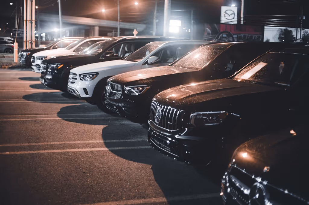Row of cars on the Aziz Motors showroom floor
