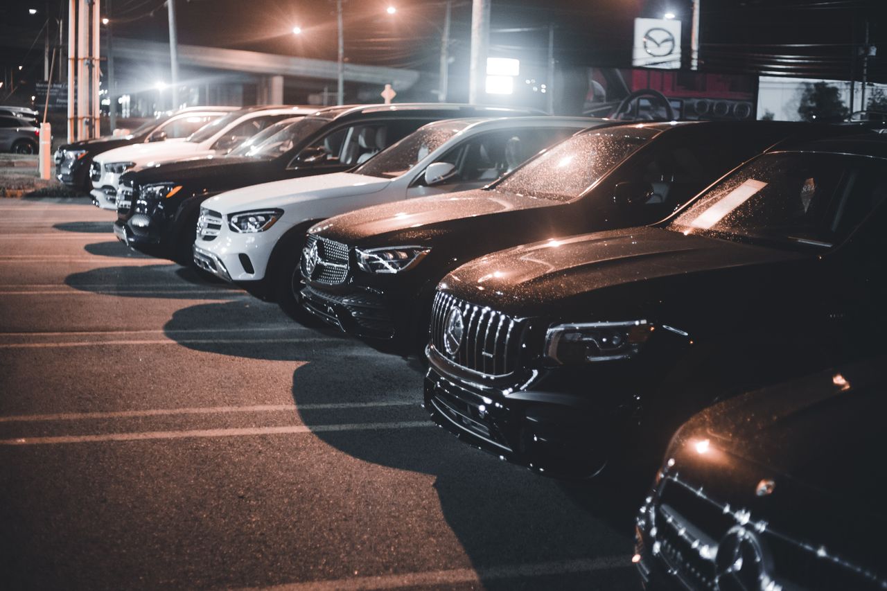 Row of cars on the Aziz Motors showroom floor